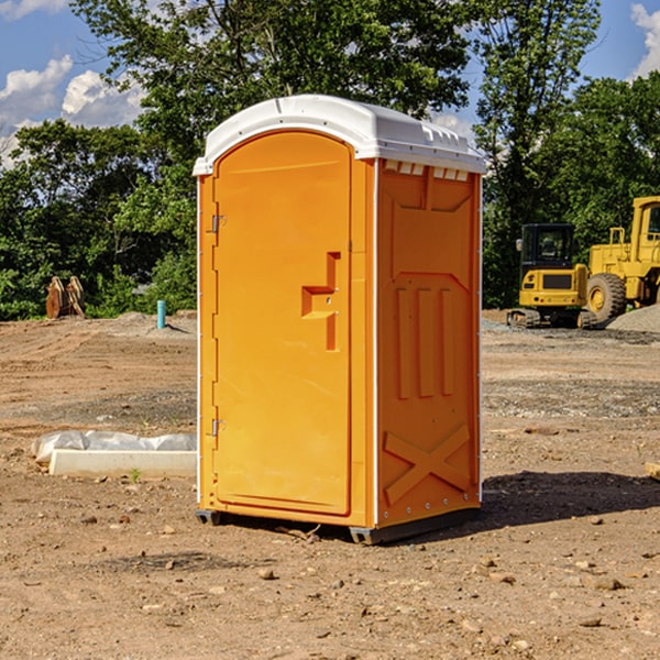 how often are the portable restrooms cleaned and serviced during a rental period in Ascension County